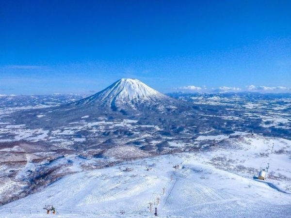 This may contain: an aerial view of a snow covered mountain