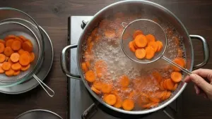 Boiling carrot slices