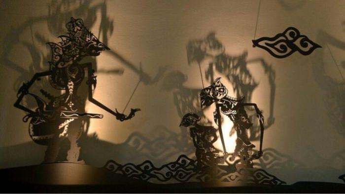 WAYANG KULIT- Ilustrasi kesenian wayang kulit yang merupakan bagian dari tradisi masyarakat Jawa.