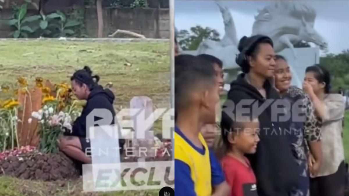 REZA ARAP ZIARAH - Reza Arap menyendiri menatap langit setelah ziarah ke makam Lula Lahfah. Sabar dimintai foto warga.