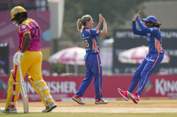 Carey (centre) amassed 149 runs at a strike rate of over 140, and picked up seven wickets.