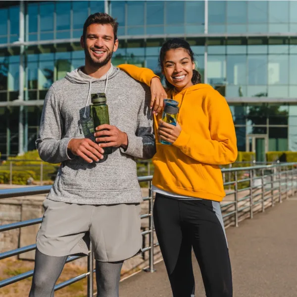 Couple smiling at people
