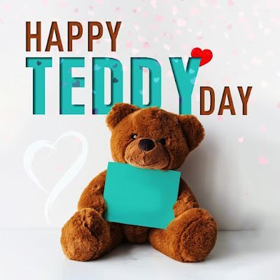 This may contain: a teddy bear holding a piece of paper with the words happy teddy day written on it