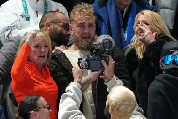 Jake Paul of the U.S. (C) cries after his fiancé Jutta Leerdam of the Netherlands won the gold medal in the womens 1,000 meters speedskating race at the 2026 Winter Olympics, in Milan, Italy, Feb. 9, 2026. Photo by AP