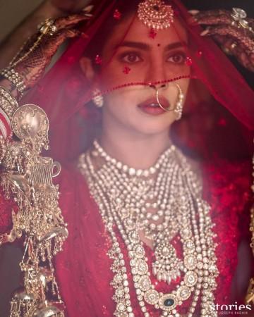 Rashmika Mandanna, Katrina Kaif, Deepika Padukone: Celebs who ditched ivory and pastel shades for traditional red and gold bridal couture at their weddings