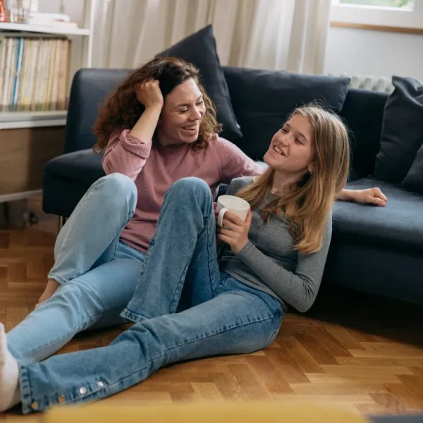 mom and teen daughter talking learning independence