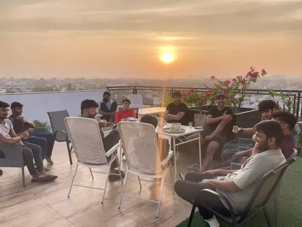 Evenings at The Residency, Bengaluru, developers from the 7th cohort unwind and share ideas on the penthouse terrace