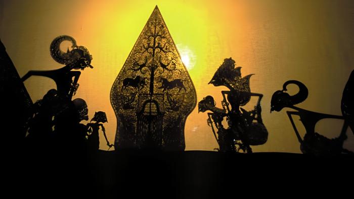 WAYANG- Ilustrasi pertunjukan wayang kulit kesenian tradisional masyarakat Jawa.