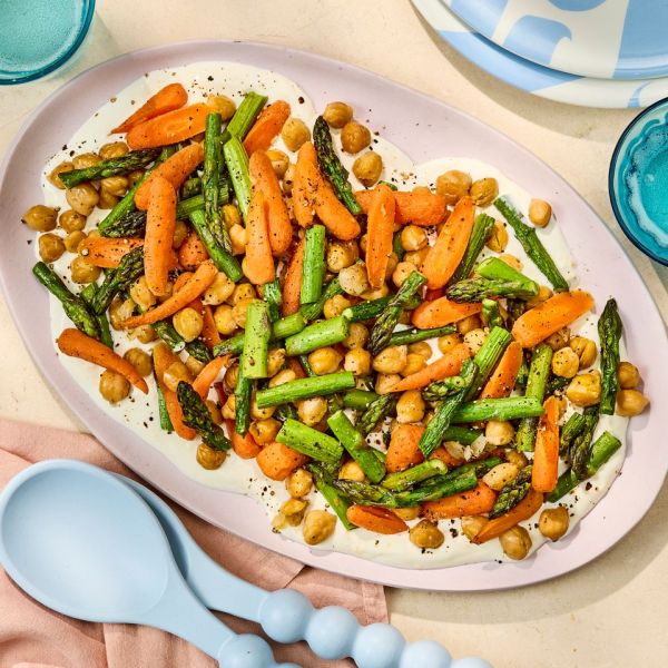 A photo of Sheet-Pan Chickpeas & Veggies recipe. Credit: Photographer: Robby Lozano, Food Stylist: Jennifer Wendorf, Prop Styling: Josh Hoggle.