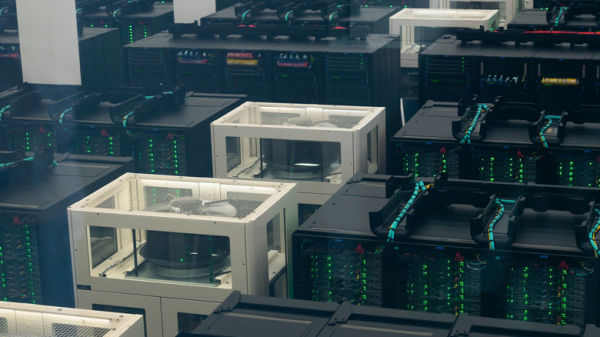 Supercomputer infrastructure inside modern data center with server racks and cabling