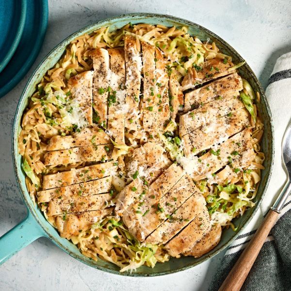 Recipe image of High-Protein Lemon Chicken Orzo with Cabbage Credit: Photographer: Jen Causey, Food Stylist: Margaret Monroe Dickey, Prop Stylist: Josh Hoggle.