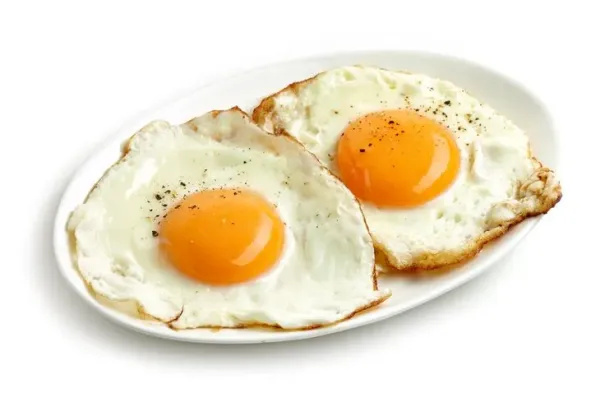 fried eggs isolated on white background