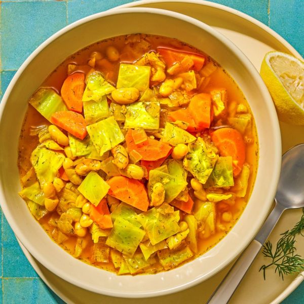 Recipe image of Turmeric Cabbage White Bean Soup. Credit: Photographer: Ali Redmond.