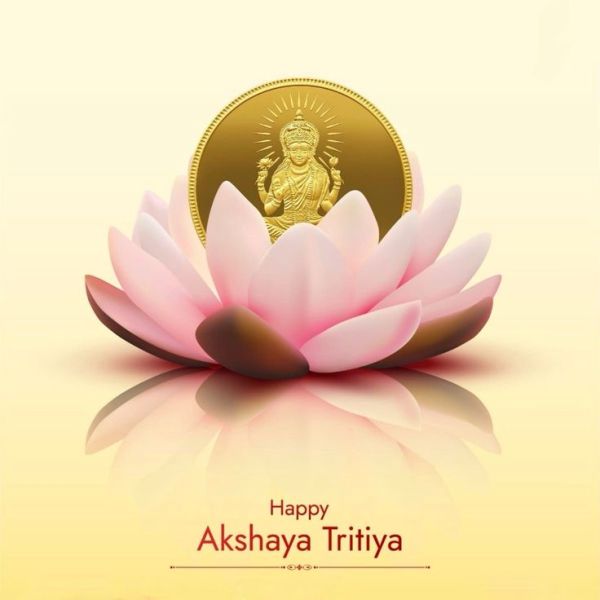 This may contain: a lotus flower with a gold coin in the background that says happy akshaya triiya