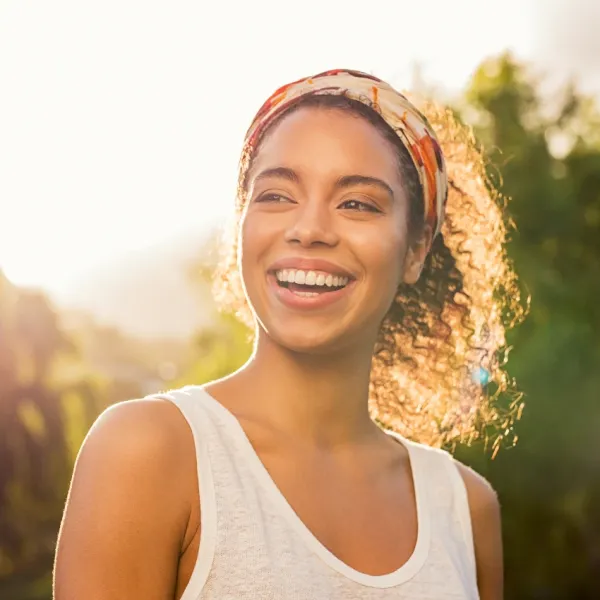 optimistic woman out in the sunshine