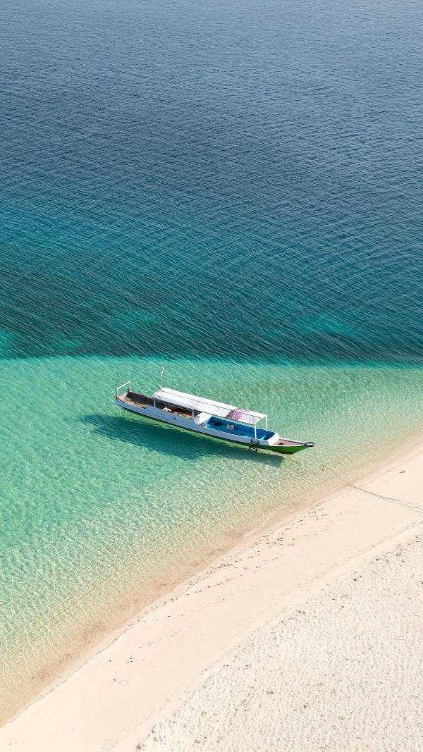 One Boat, One Paradise