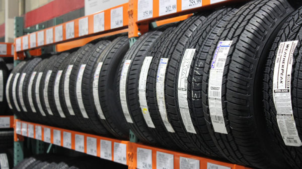 Picture showing tires displayed in a Costco