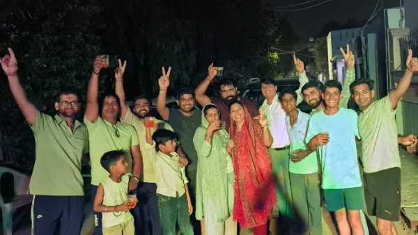 Prince's mother Santosh and cousins celebrate outside their home in Dariyapur Khurd after he was named in the India squad. <div style=