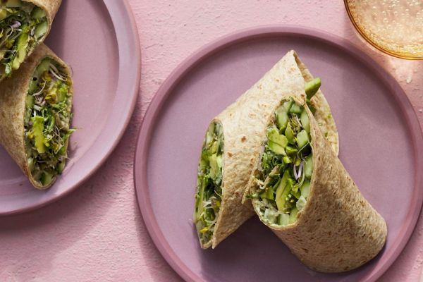 Green Goddess Wraps on 2 plates with sparkling water Credit: Photographer: Fred Hardy, Food Stylist: Jennifer Wendorf