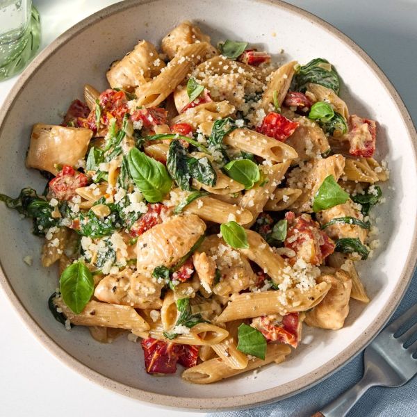 A recipe image of Marry Me Chicken with Spinach & Penne Credit: Photographer: Jen Causey, Food Stylist: Julian Hensarling, Prop Stylist: Christina Daley.