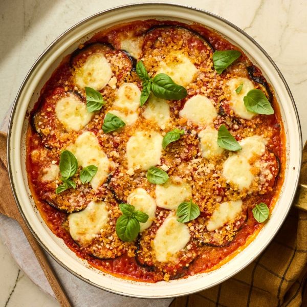 a recipe photo of Skillet Eggplant Parmesan Credit: Photographer: Victor Protasio, Food Stylist: Chelsea Zimmer, Prop Stylist: Hannah Grennwood.