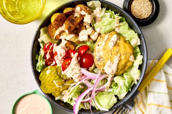 a recipe photo of Cheeseburger Salad Credit: Photographer: Hannah Hufham, Food Stylist: Marianne Williams , Prop Stylist: Keoshia McGhee