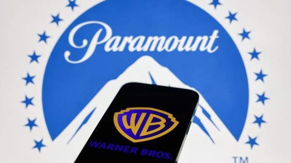 Paramount logo displayed on a laptop screen and Warner Bros logo displayed on a phone screen are seen in this illustration photo taken in Krakow, Poland on February 28, 2026. (Photo by Jakub Porzycki/NurPhoto via Getty Images)