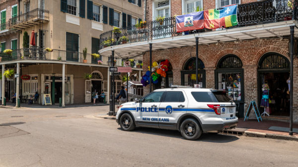 Police car parked on a New Orleans street.
