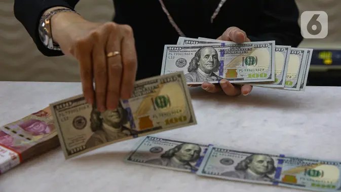 Mengutip data Bloomberg, pada penutupan perdagangan awal pekan ini, Senin (13/1/2025), nilai tukar rupiah melemah signifikan terhadap dolar Amerika Serikat (AS). (Liputan6.com/Angga Yuniar)