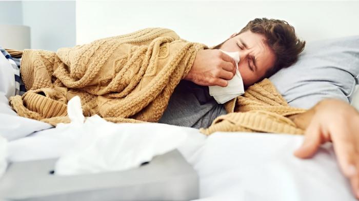 INFLUENZA A- Ilustrasi seorang pria yang terpapar Influenza A. Biasanya penyakit ini disertai dengan nyeri otot.