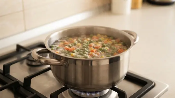 Trik Merebus Sayur Frozen agar Warna Tetap Hijau dan Kandungan Gizinya Terjaga (AI Generated)