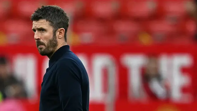 Ekspresi manajer Manchester United, Michael Carrick. (Paul Ellis/AFP)