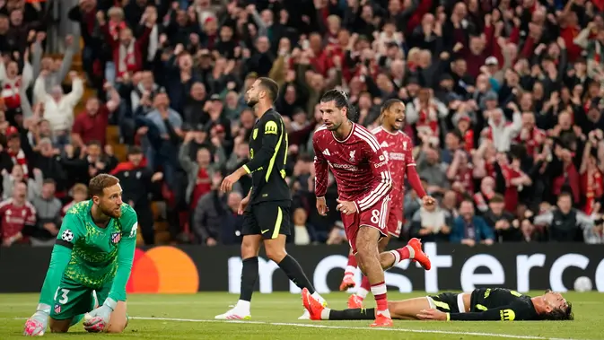 Pemain Liverpool Dominik Szoboszlai merayakan gol dalam laga Liga Champions antara Liverpool vs Atletico Madrid di Liverpool, Inggris, Rabu, 9 September 2026. (AP Photo/Dave Thompson)