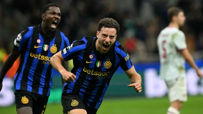 Inter Milan Bek asal Brasil bernomor punggung 30 milik Inter Milan, Carlos Augusto, merayakan gol pertama timnya dalam pertandingan Liga Champions UEFA putaran pertama hari ke-3 antara Inter Milan dan Shakhtar Donetsk di Stadion San Siro, Milan, pada 22 Oktober 2026. (Stefano Rellandini/AFP)